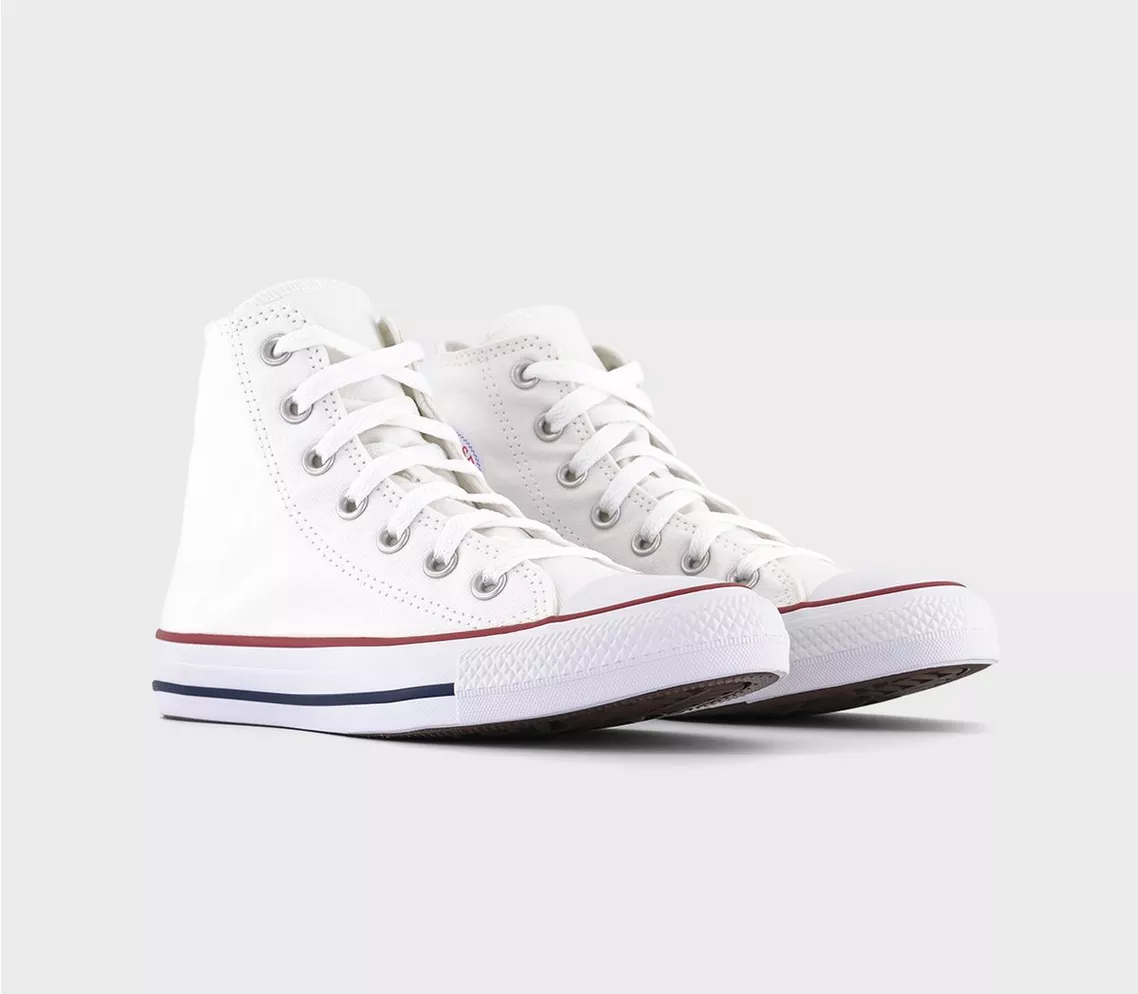 A pair of white high tip Converse shoes with red and blue lines along the bottom.